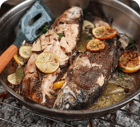 A warm, freshly cooked fish dish